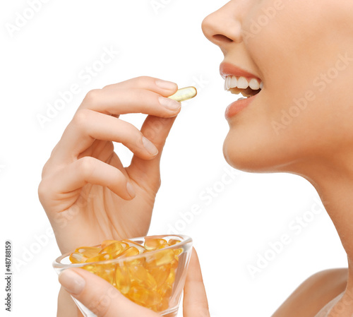 Photo: woman with vitamins woman with vitamins
