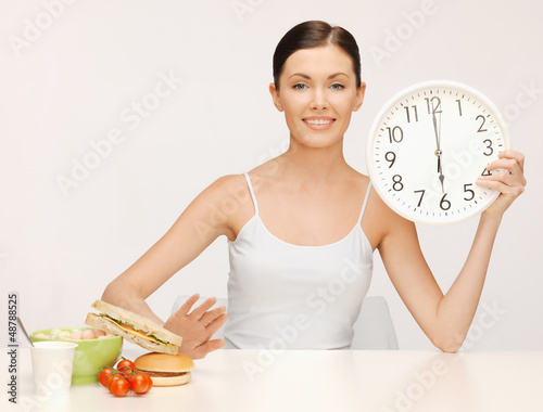 Photo: woman with big clock woman with big clock