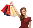 teenage girl in red dress with shopping bags