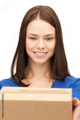 Photo: woman with cardboard box woman with cardboard box