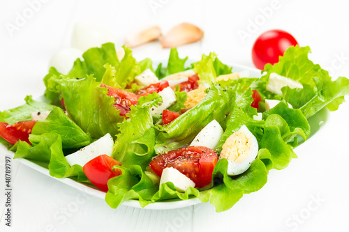 Photo: salad with tomatoes and mozzarella salad with tomatoes and mozzarella