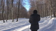 Video: Young woman walking in forest, winter time Young woman walking in forest, winter time