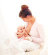 Mother breast feeding her infant