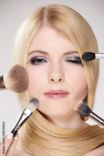 Photo: Hübsche Frau mit Gesichts Make up Hübsche Frau mit Gesichts Make up