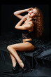 beautiful young woman in black lingerie