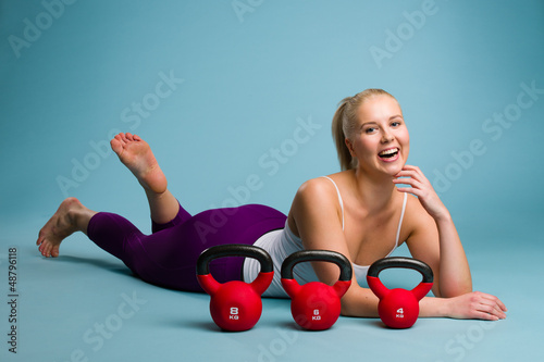 Photo: Girl and kettlebell Girl and kettlebell