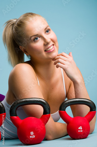 Photo: Girl and kettlebell Girl and kettlebell