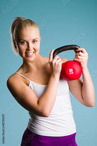 Photo: Girl and kettlebell Girl and kettlebell
