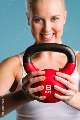 Photo: Girl and kettlebell Girl and kettlebell