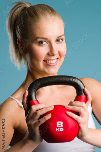 Photo: Girl and kettlebell Girl and kettlebell