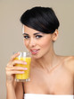 Woman enjoying a glass of orange juice