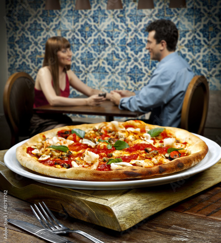 Photo: casal na pizzaria casal na pizzaria