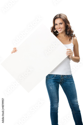Photo: Beautiful young woman showing blank signboard Beautiful young woman showing blank signboard
