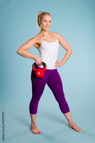 Photo: Girl and kettlebell Girl and kettlebell