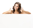 Beautiful young woman with blank signboard