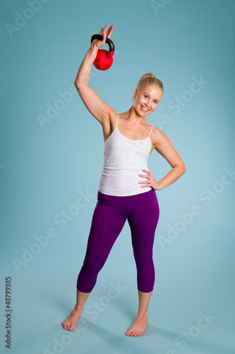 Photo: Girl and kettlebell Girl and kettlebell