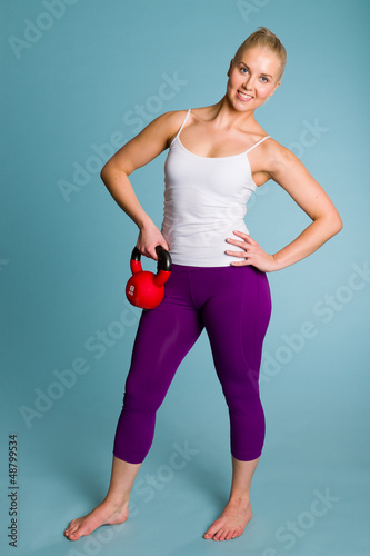 Photo: Girl and kettlebell Girl and kettlebell