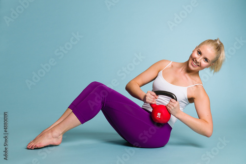 Photo: Girl and kettlebell Girl and kettlebell