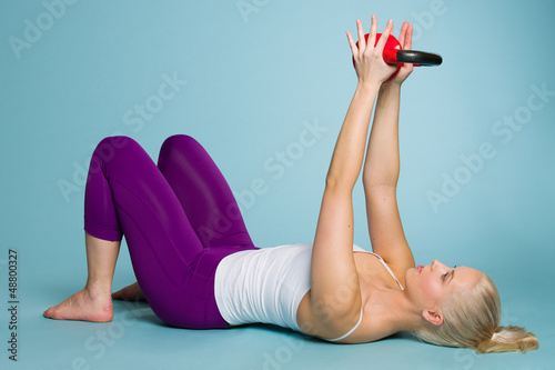 Photo: Girl and kettlebell Girl and kettlebell