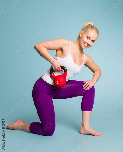 Photo: Girl and kettlebell Girl and kettlebell