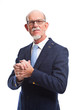Smiling well dressed senior man with glasses. Isolated.