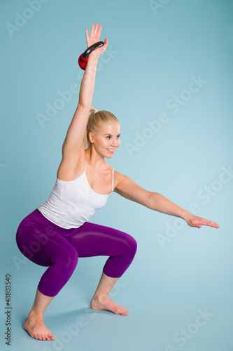 Photo: Girl and kettlebell Girl and kettlebell