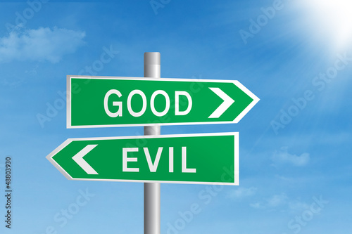 Photo: Good vs evil road sign Good vs evil road sign