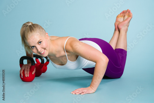 Photo: Girl and kettlebell Girl and kettlebell
