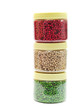 Red, green and white pepper peas casting up in boxes isolated on
