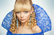 Blond woman with blue decorations