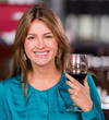 Woman having a glass of wine