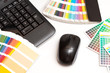 color swatches and computer keyboard, mouse
