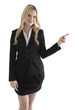 Beautiful young businesswoman pointing at white copyspace