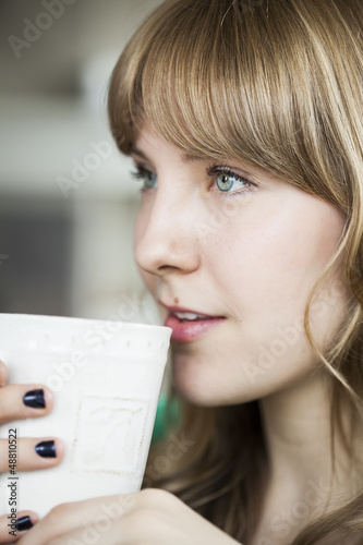 Photo: Young Woman with Beautiful Blue Eyes Young Woman with Beautiful Blue Eyes