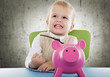 kind mit sparschwein