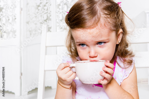Photo: Girl with the tea cup Girl with the tea cup