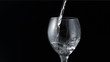 Water pouring into wine glass