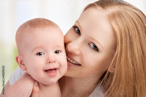 Photo: happy family. mother and baby happy family. mother and baby