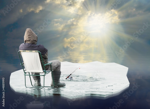 Photo: The fisherman floating on a iceberg. The fisherman floating on a iceberg.