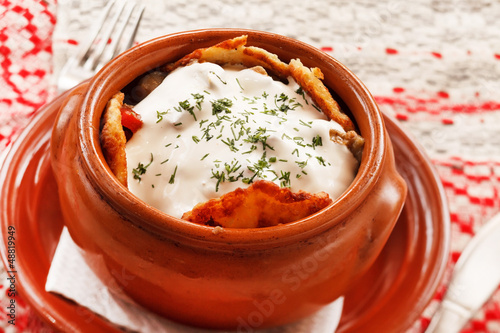 Photo: potato pancakes in the pot (national belorussian food) potato pancakes in the pot (national belorussian food)