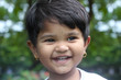 Beautiful young indian girl child smiling & happy and having fun