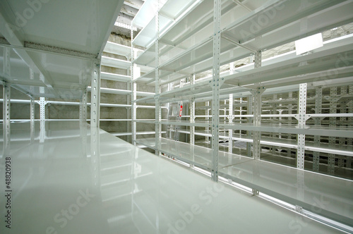 Photo: Empty warehouse, storage racks Empty warehouse, storage racks