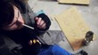 Video: homeless man lighting a cigarette homeless man lighting a cigarette
