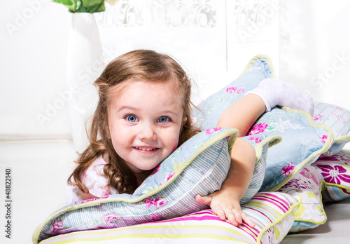 Photo: Girl with pillows Girl with pillows