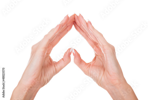 Photo: female hands show heart symbol, isolated on white female hands show heart symbol, isolated on white
