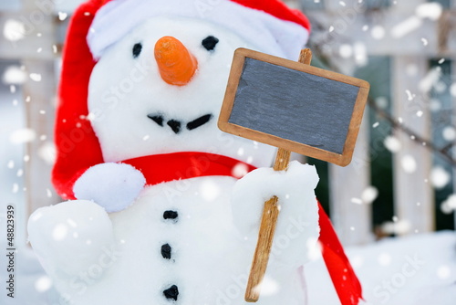 Photo: Schneemann mit Tafel Schneemann mit Tafel