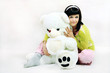 Young girl with teddy bear