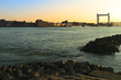 Railway bridge crossing the river in Dordrecht at sunset