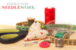 tools for needlework, thread, scissors and tape measure 