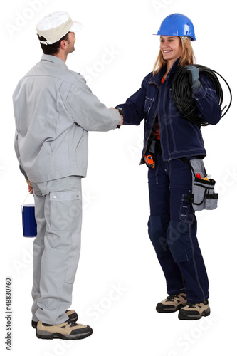 Photo: Workers greeting each other Workers greeting each other